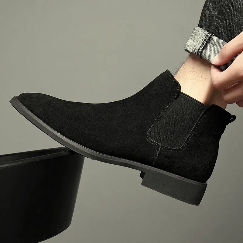 Men's pointed suede short Martin boots in black with cowhide upper and pigskin lining on a neutral background