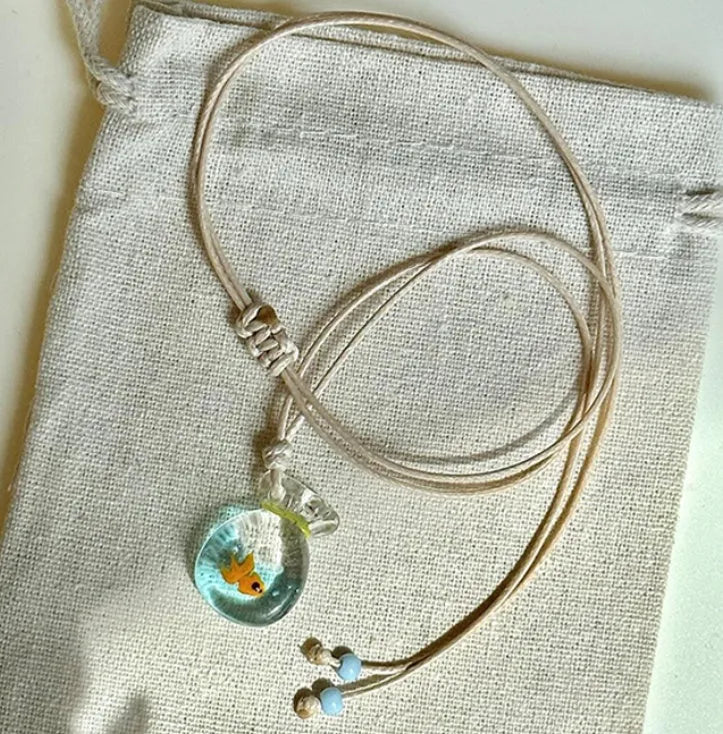 Women's coloured glaze pendant necklace on cotton linen clavicle chain with world style design