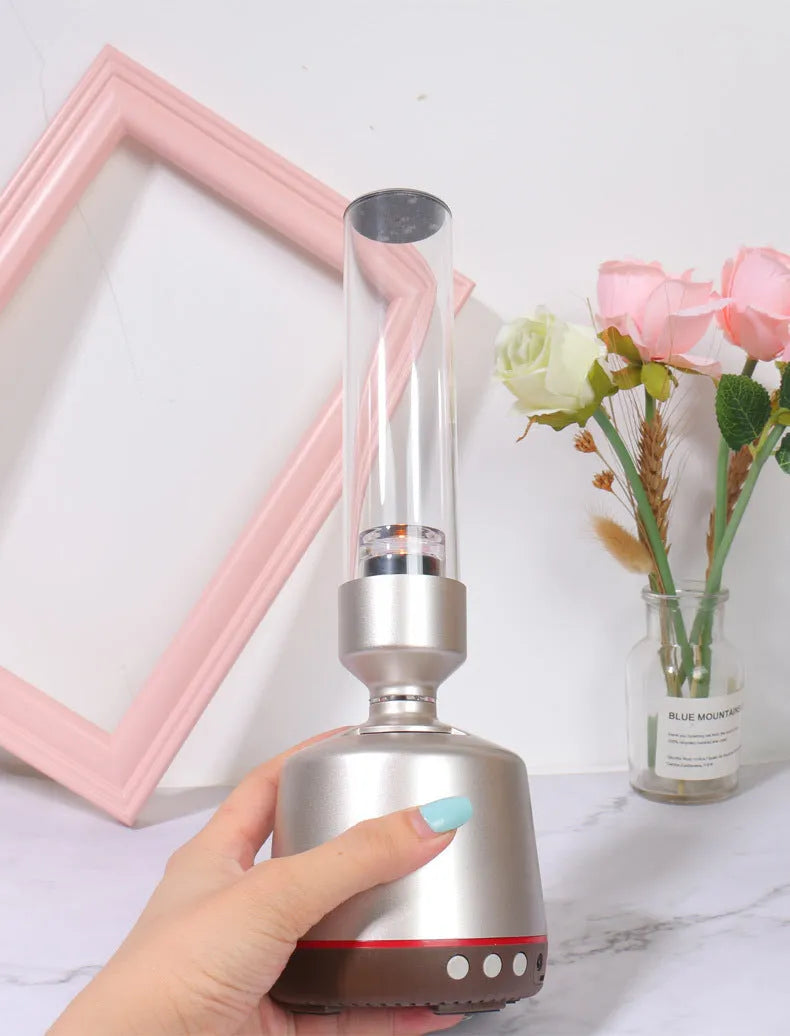 White silver Bluetooth speaker with integrated night light and atmospheric lighting functions
