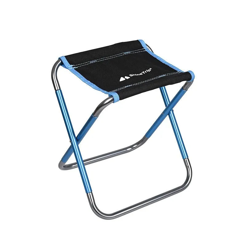 Black ethnic style aluminium alloy folding stool in open position for outdoor seating