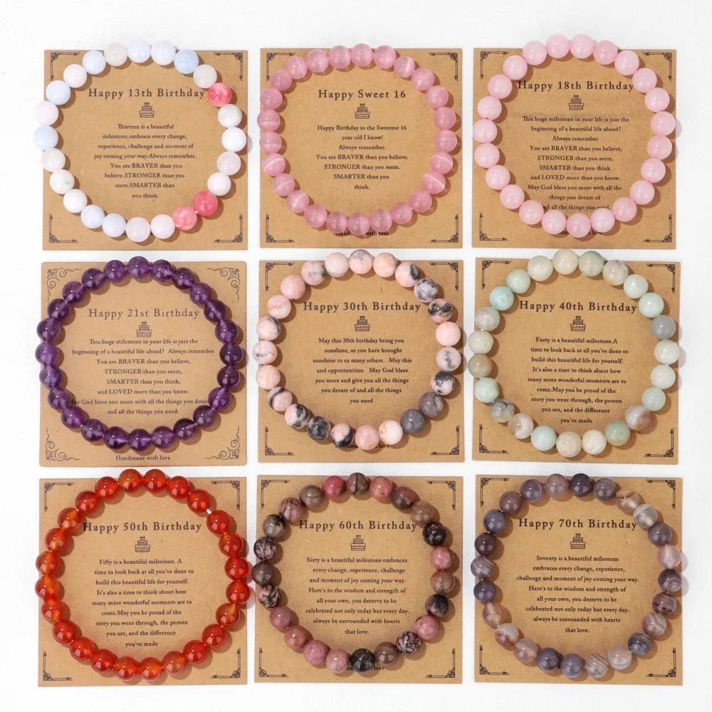 Men's natural stone beads elastic string bracelet 19cm length with birthday card on neutral background