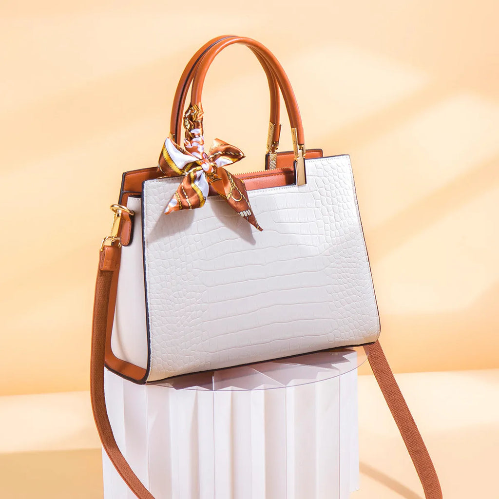 Milky white women's PU shoulder handbag with organised internal compartments on a plain background.