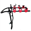 Black and red trunk mounted car bike holder rack with iron frame.