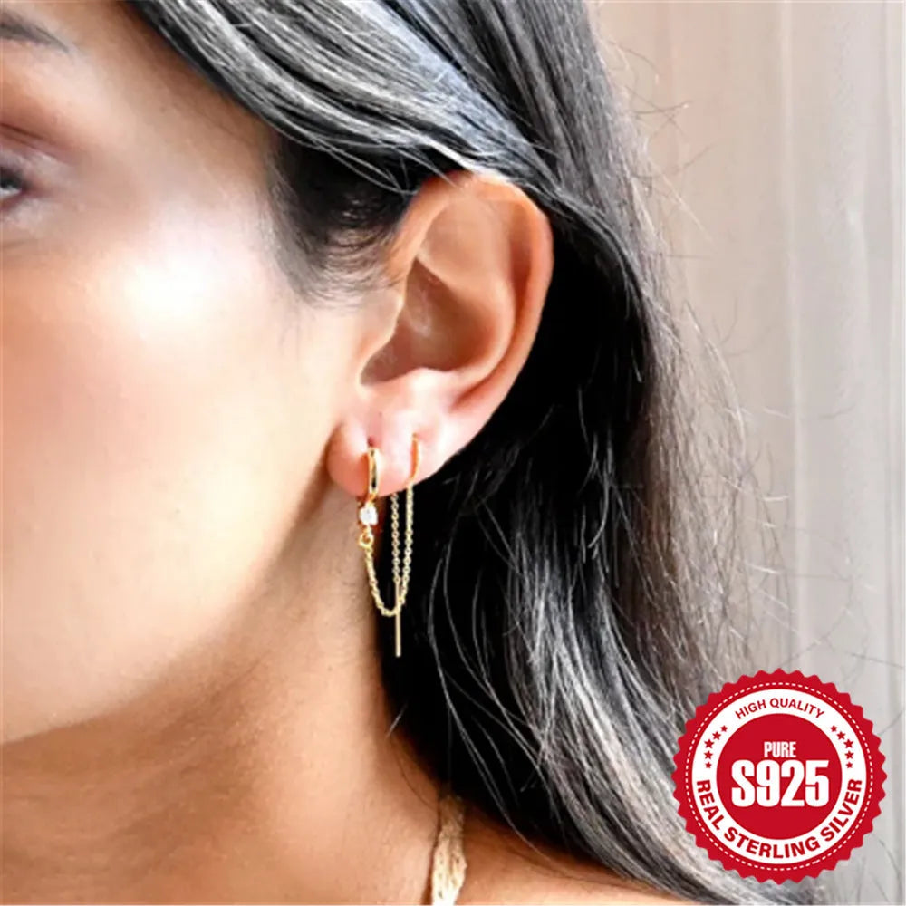 S925 sterling silver stud earrings with flower, tassel, and chain design in gold electroplated finish.