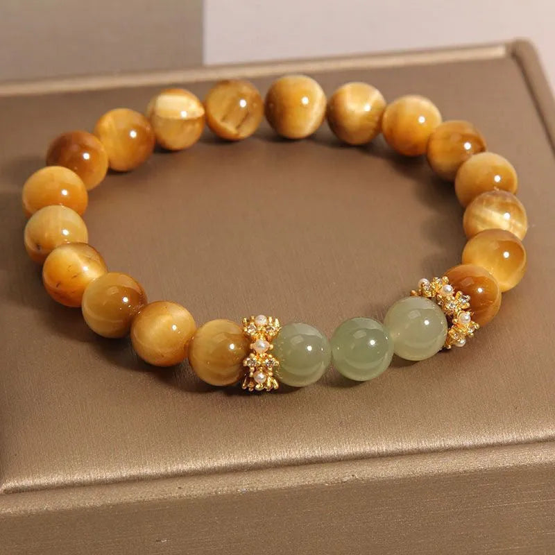 Natural yellow Tiger's Eye Hetian Jade bracelet with symbolic Chinese patterns in U-shaped design