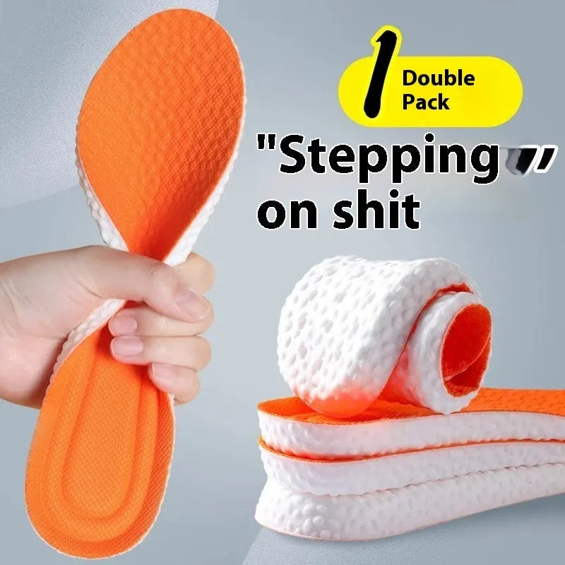 Breathable grey, black, and orange PU foam sports insoles with cut-to-fit sizing lines.