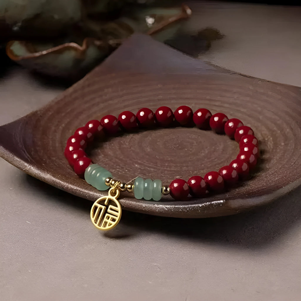 Traditional handmade gold cinnabar wave bracelet with copper bead accents in pumpkin or brand cinnabar colour options