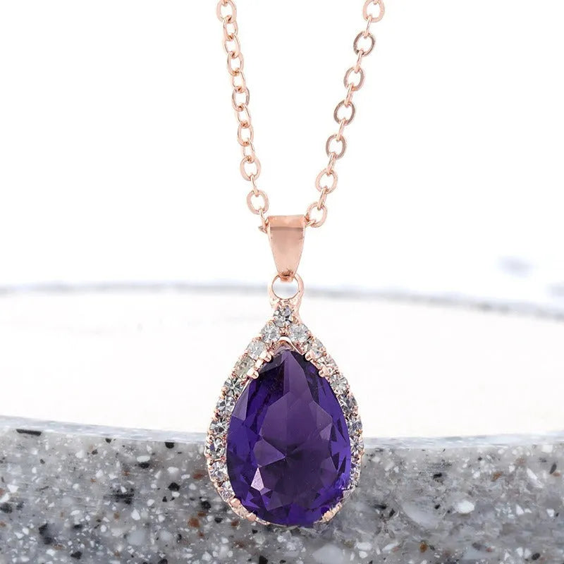 Women's geometric drop shape alloy necklace with rhinestone accents in rose gold pink colour