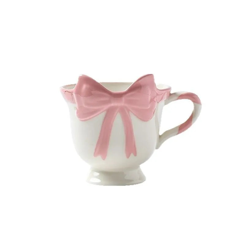 Ceramic mug with a girl heart bow design in white powder and black pink colour options
