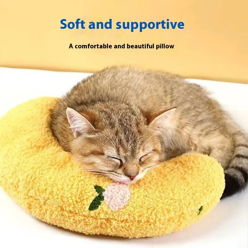 Blue U-shaped cat pillow showing neck support design for pet bedding