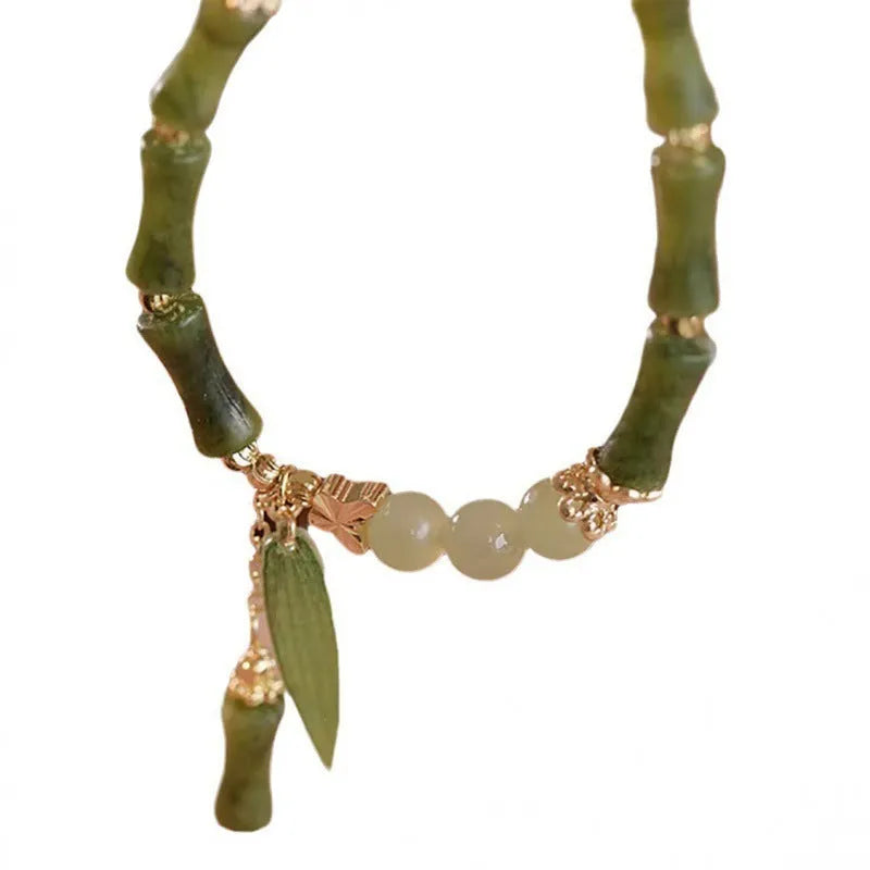 Chinese style glass bamboo leaf bracelet for women with manual craft details.