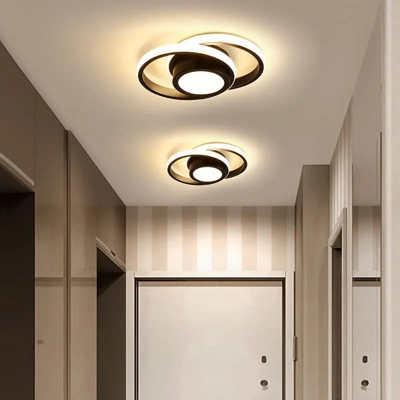 Modern LED corridor ceiling light with silicone shade, shown in black and white butterfly and circular frame designs.