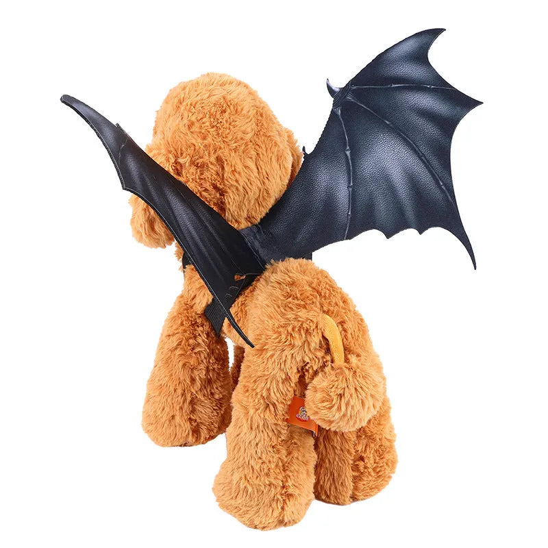 Black cloth bat wing costume for a cat or dog on a Halloween background.