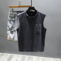 A solid colour loose cotton sleeveless t-shirt on a hanger, shown in white and black.