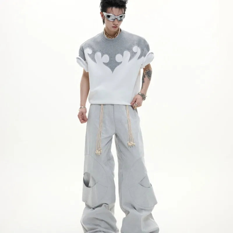 Men's short sleeve cotton shirt with burnt flower embroidery and rhinestone detailing in loose fit drop shoulder design
