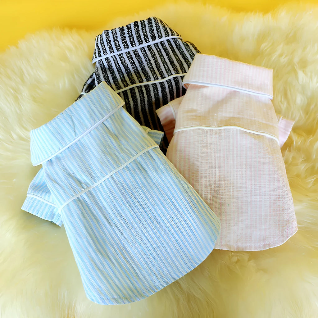 Striped cotton and linen two-legged pet pajamas for dogs and cats in pink, blue, or black and white, sizes XS to XL