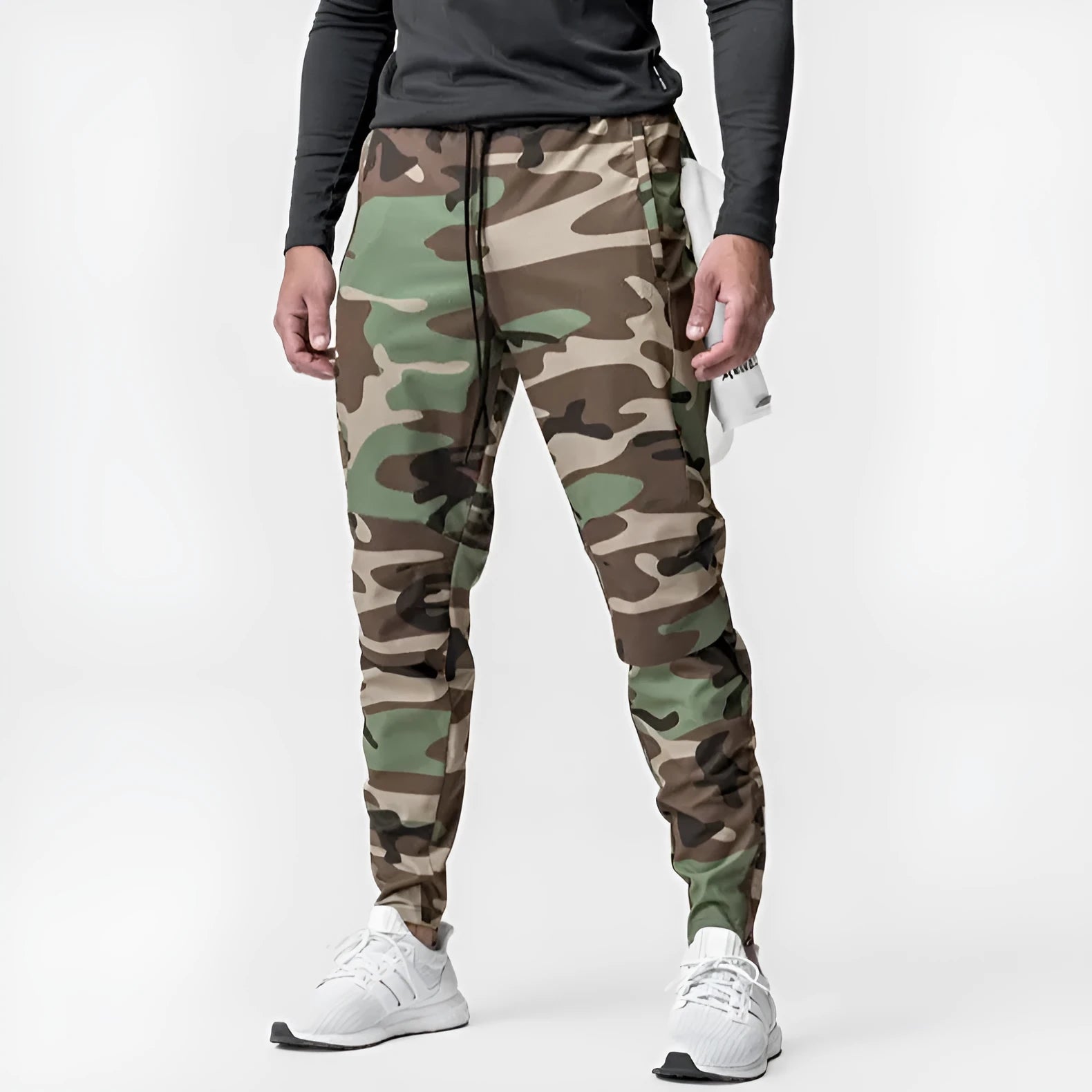 Men's dark grey quick-dry ankle-tie fitness pants shown in a loose fit.