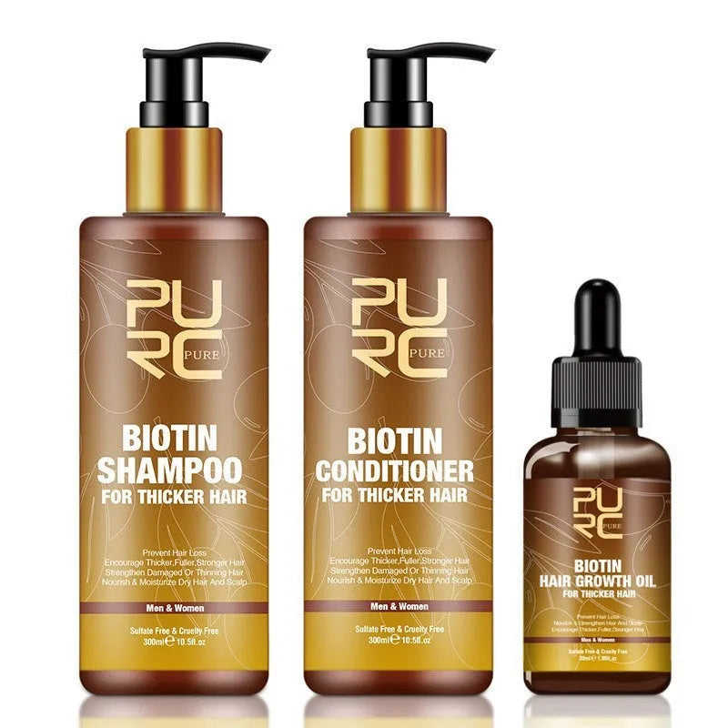 PURC Ginger Biotin three-piece hair care set with shampoo, conditioner, and essential oil in white bottles