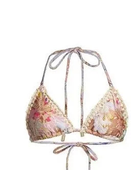Women's floral pattern bikini set with top, briefs, and skirt in creamy-white colour