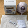 Astronaut-shaped portable USB humidifier with colourful LED light on a desk