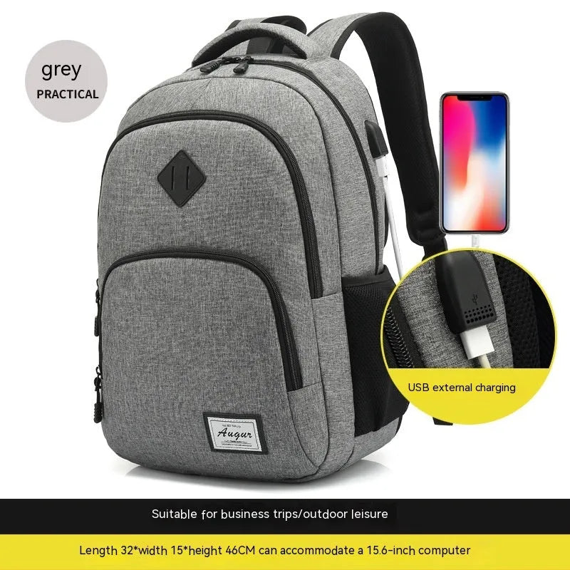 Grey lightweight backpack with USB charging port on strap and trolley sleeve.