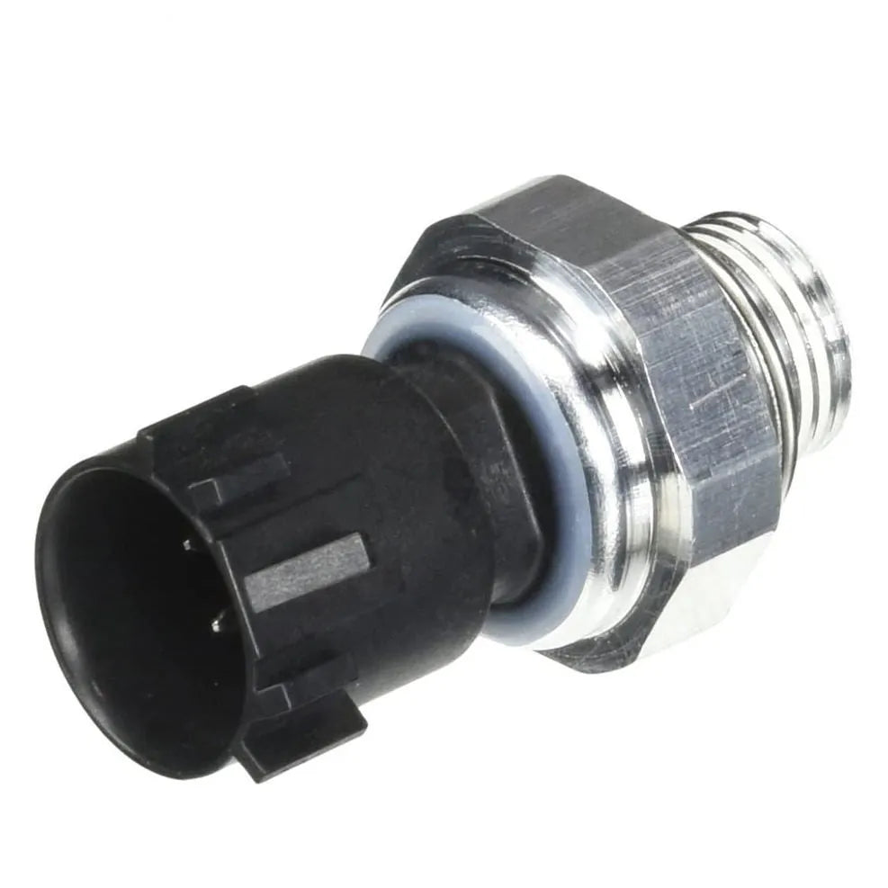 Silver automobile fuel pressure sensor replacement part on a white background.