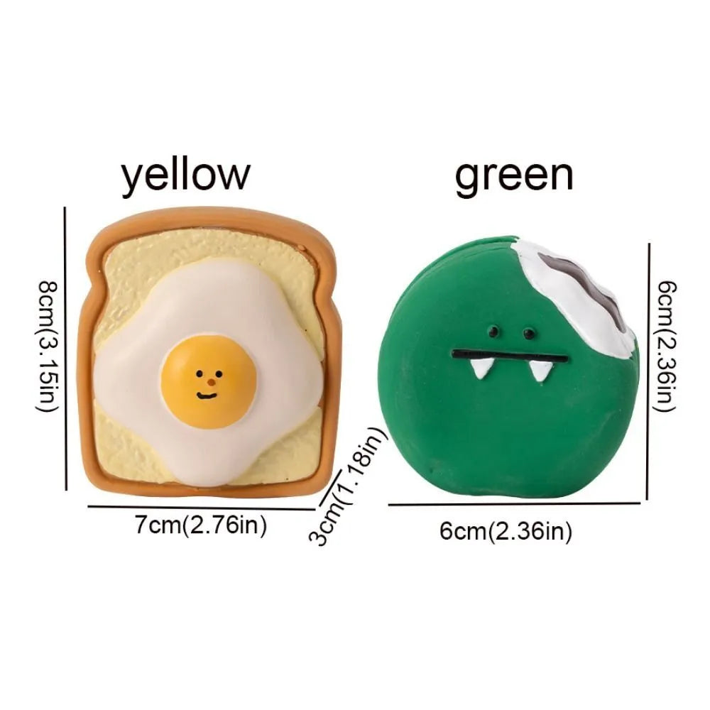 Yellow or green cartoon bread-shaped latex chew toy for dogs with a squeaker inside.