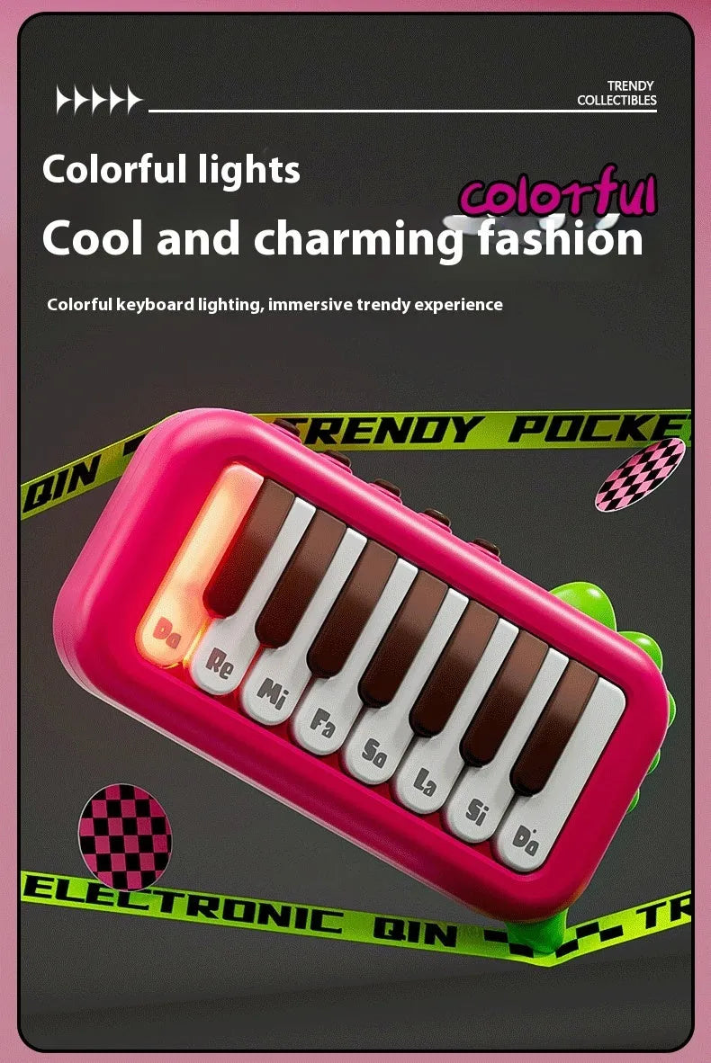 Baby pocket electronic keyboard with little piano pattern in green plastic design