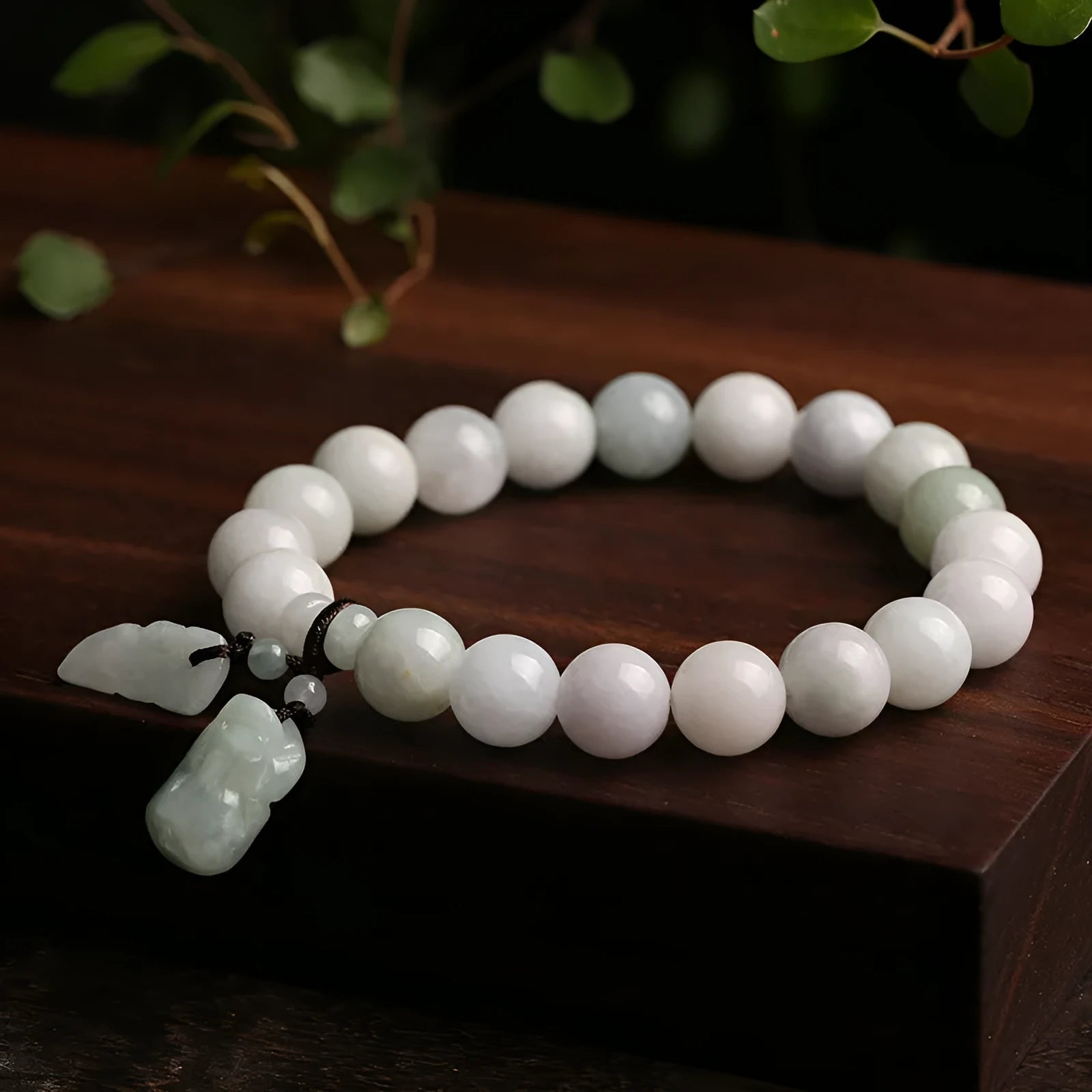Natural emerald jade bracelet with geometric pendant and Maitreya Buddha charm