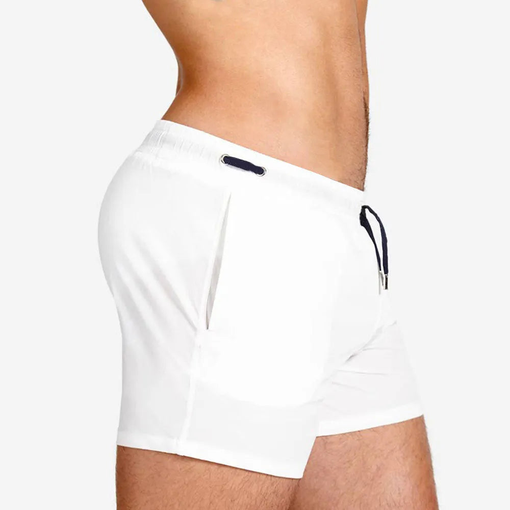 Mesh lining swimming sports fitness shorts in polyester available in six solid colours