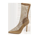 Gold women's high heel sandals with pointed toe, stiletto heel, and mesh upper.