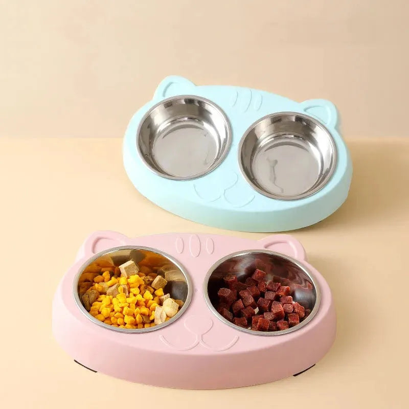 Blue macaron-shaped plastic pet feeder tray with two bowls for food and water