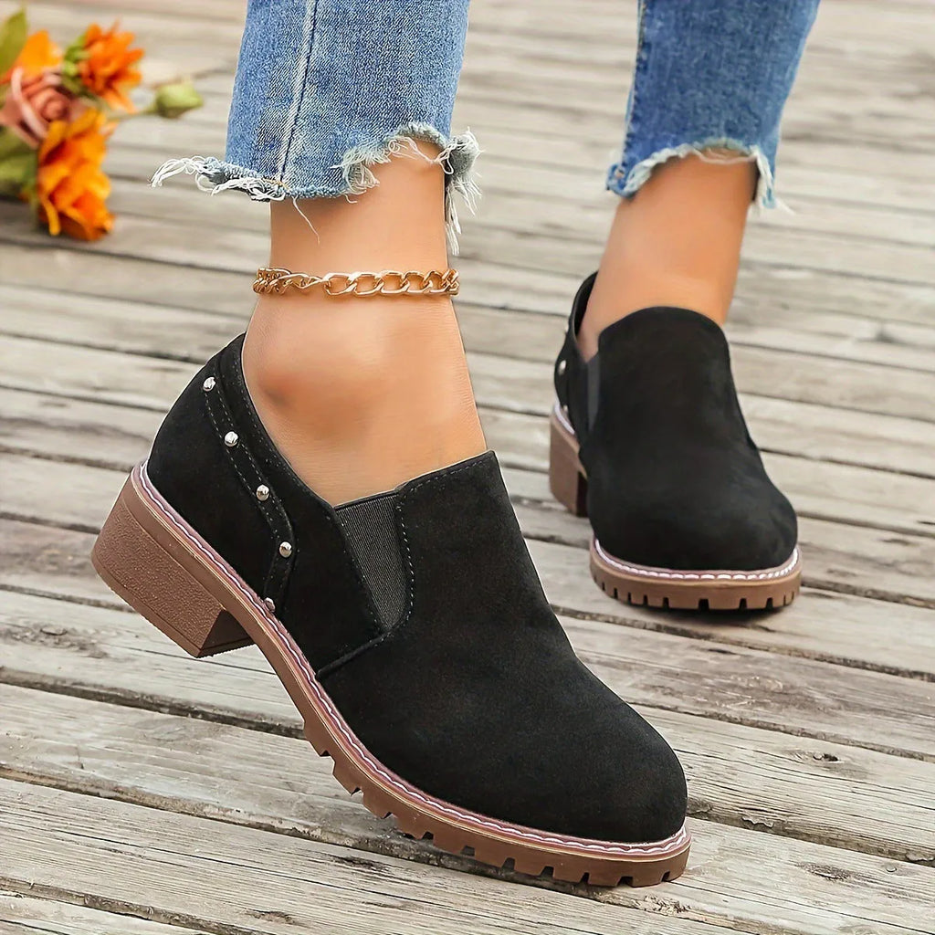 Plus size women's ankle boots in black suede with thick low heel and elastic band