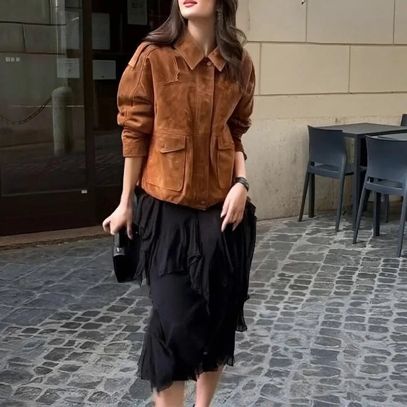 Women's bright brown suede-style street chic coat with regular sleeves on a hanger