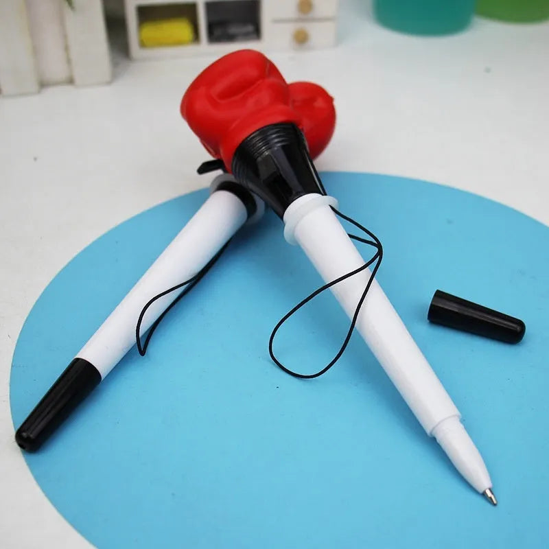 Four pressure relief boxing press ejection pens with 0.7mm bullet tips and black ink refills