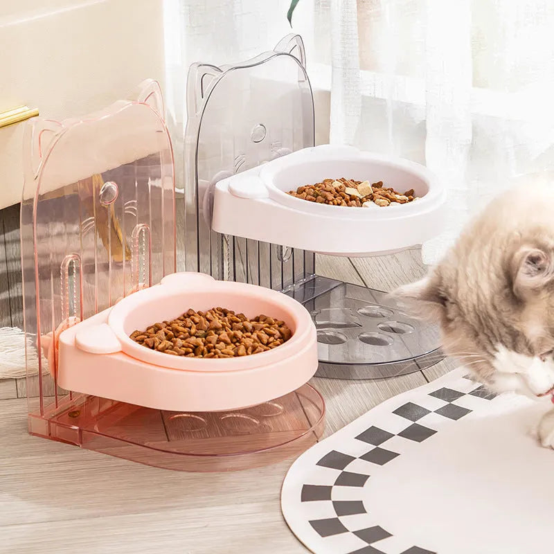 Grey cat feeding bowl with anti-spill design and removable cage, adjustable height.