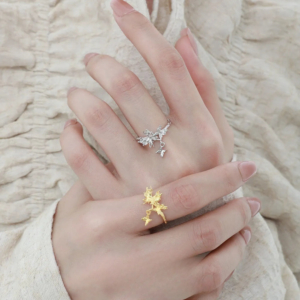 Silver butterfly ring with adjustable opening in gold-colour finish