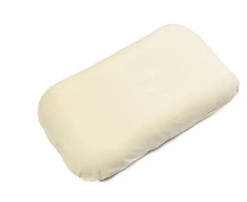 Beige portable baby nest crib cot for newborns on a neutral background.