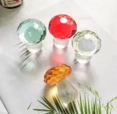 Geometric crystal mushroom decoration in transparent, green, red, or yellow measuring 40mm by 53mm