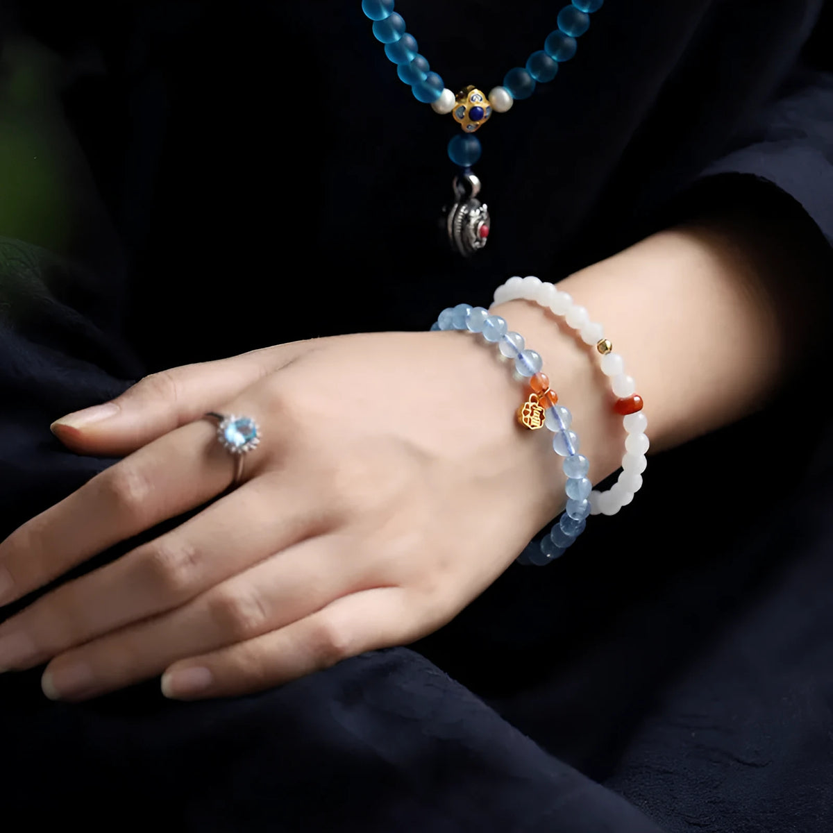 Ice translucent aquamarine bracelet with 8mm round beads and silver sequin accents