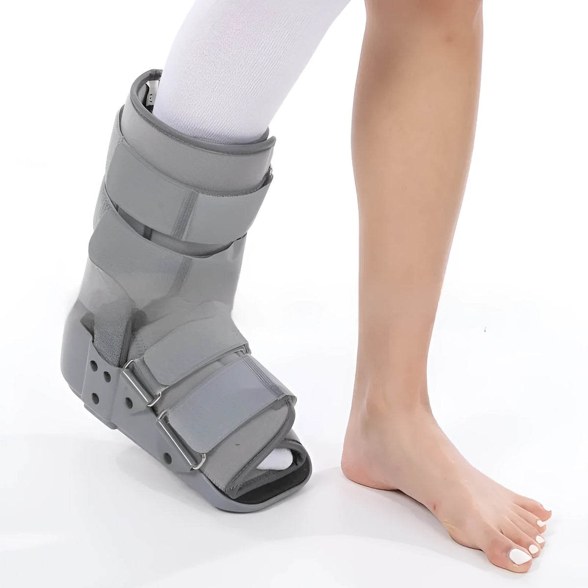 Grey Achilles tendon rehabilitation walking boot with fixed support design and adjustable sizing