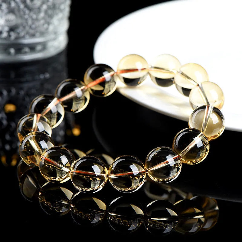 Natural citrine scattered beads bracelet showing 7A and 6A grade polished stones in original design