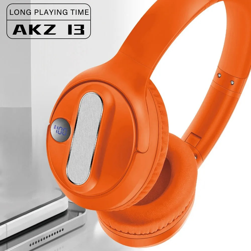 Foldable wireless Bluetooth earphones in retro style, available in orange black and white