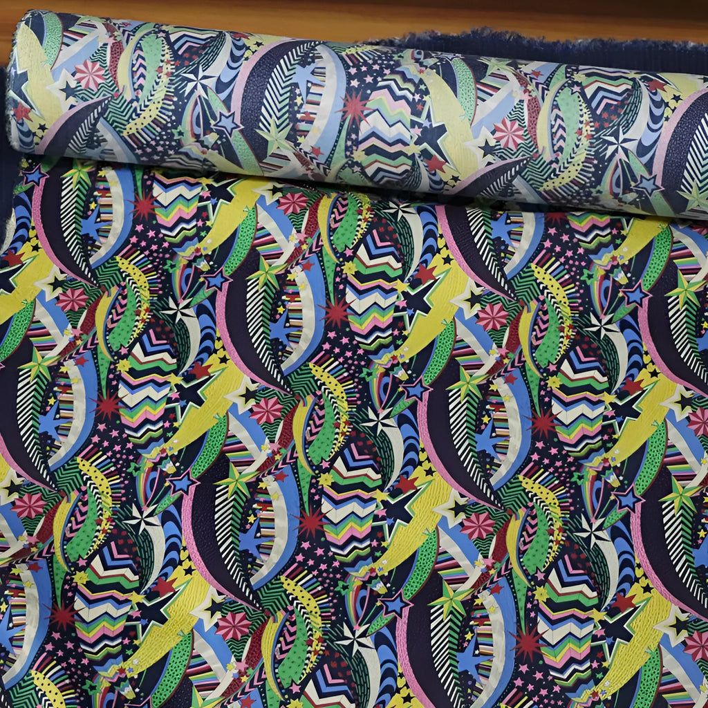 Blue cotton fabric with digitally printed plant and flower design showing 145cm width