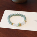 Myanmar jade safety buckle bracelet with geometric peace buckle charm on wrist