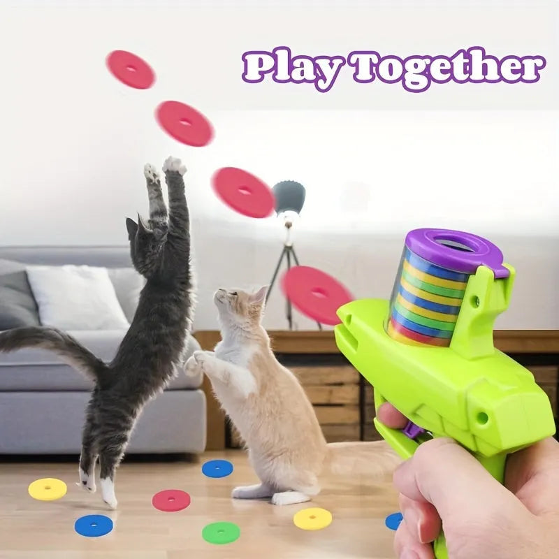 Green battery-free cat toy launcher with foam discs for interactive indoor pet play