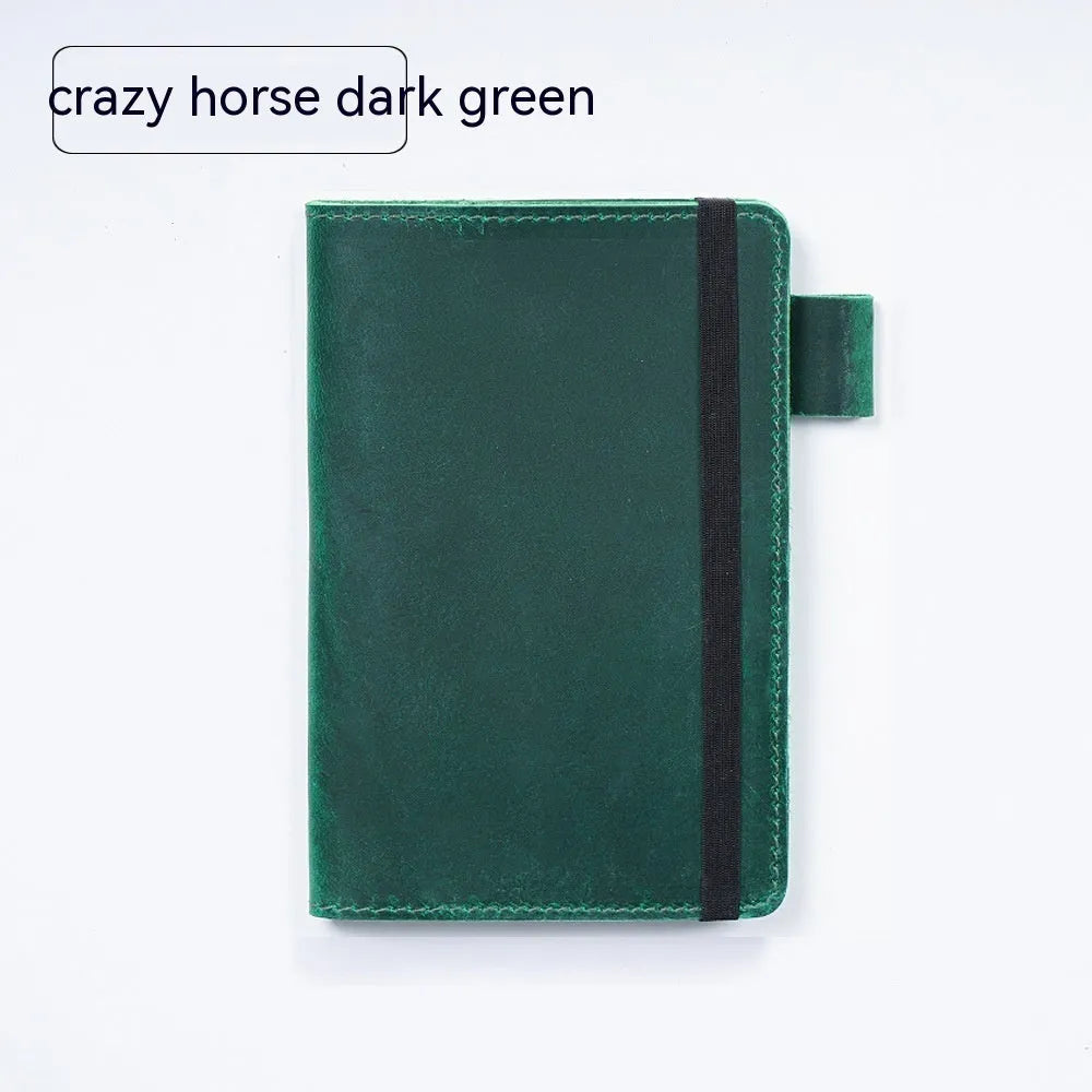 Handmade kraft notebook with a cowhide leather cover, shown open on wood-free paper.