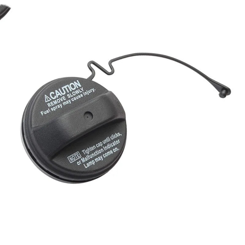 Black snap-type fuel tank cap replacement part for Toyota vehicles