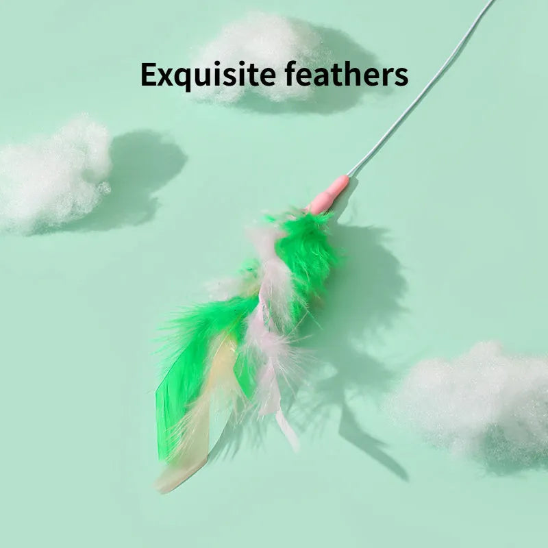 Green interactive cat feather wand toy with bells attached for indoor play and training