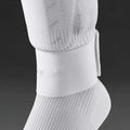 Red rubber football shin guard strap laid flat showing its 25cm length and 6.5cm width.